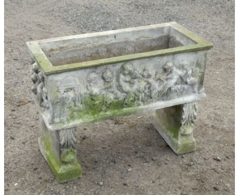 COMPOSITION TROUGH WITH PUTTI IN RELIEF, ON END SUPPORTS (64.5 cm x 87 cm) [NB THIS LOT WILL NOT BE AT THE AUCTION VENUE]