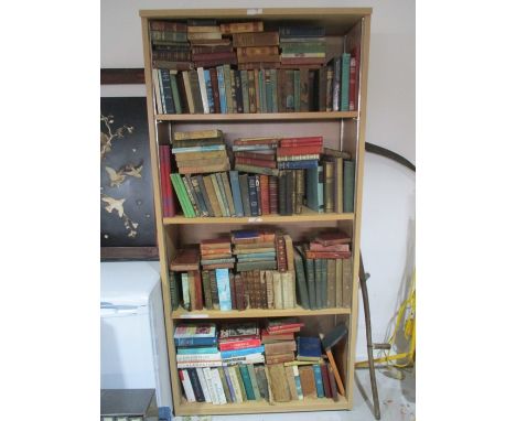 A large collection of various vintage books - over four shelves