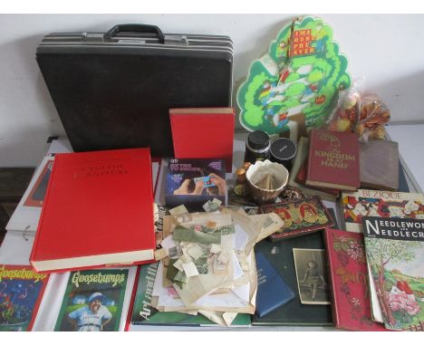 A collection of miscellaneous items including a camera lens, Winnie the Pooh &amp; Trigger small soft toys, loose stamps, bri