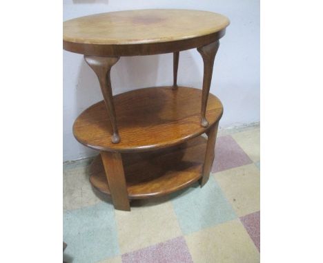 An oak Art Deco oval coffee table along with one other