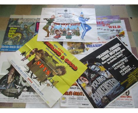 A collection of British quad film posters including Lucky Touch, Spys, Call of the Wild, Double Bill - When Eight Bells Toll/