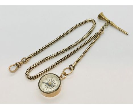 A 9ct gold watch chain with 9ct compass and a gold coloured watch key with moss agate seal, total weight 24.2g