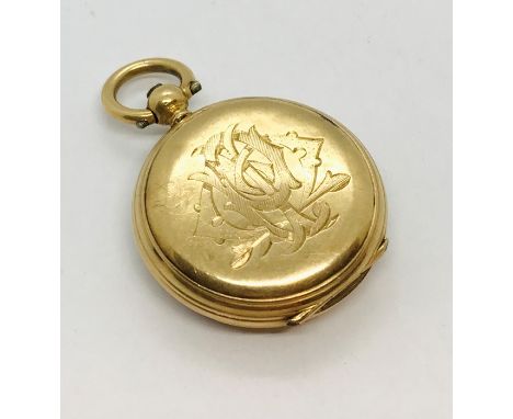 An 18ct gold compass fob
