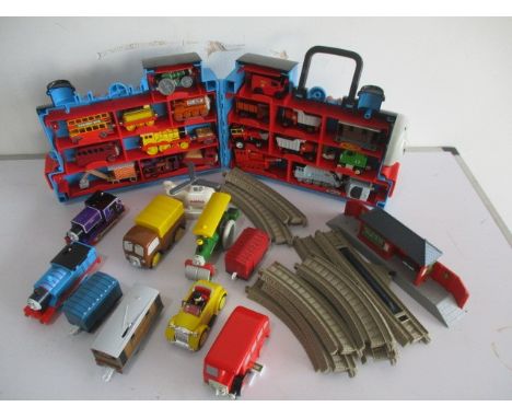 A Thomas &amp; Friends "Ride The Rails" starter set, along with a Thomas The Tank Engine carry case full of toys and other va