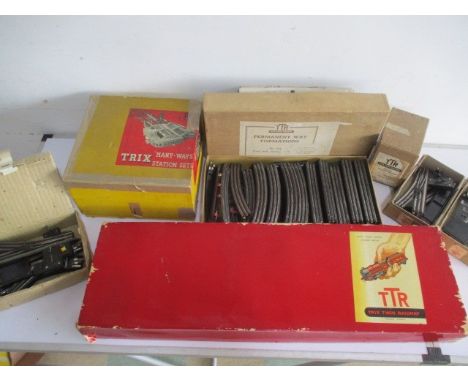 A collection of vintage boxed Trix Twin Railway, including a Goods Train Set  (No 2/324). "Many-Ways" station sets, single tr