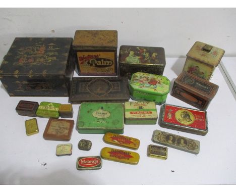 A collection of various vintage tins