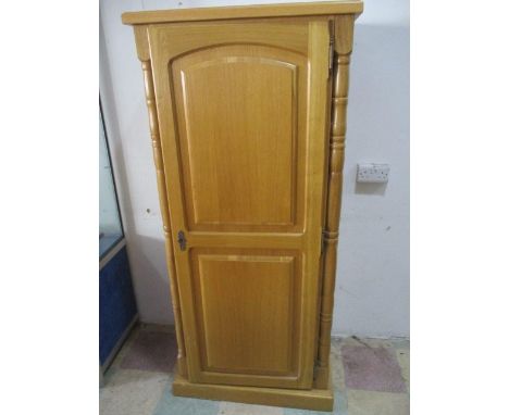 A light oak effect wardrobe