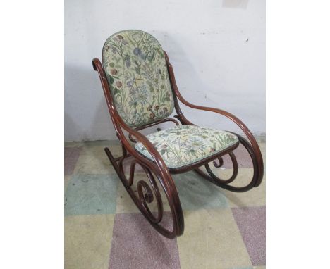 A vintage bentwood rocking chair