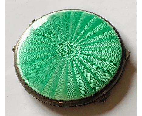 A Guilloche enamel and silver compact