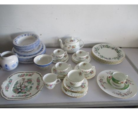 A collection of dinner and tea ware including Royal Worcester, Mintons etc.