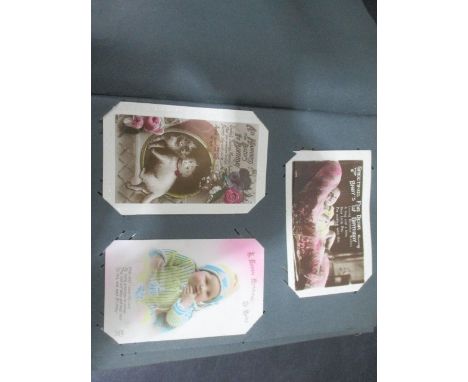 An album of vintage postcards, greeting cards etc.