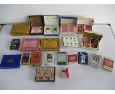 A collection of various vintage playing cards etc