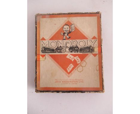 A vintage boxed Monopoly game, manufactured by John Waddington Ltd. 