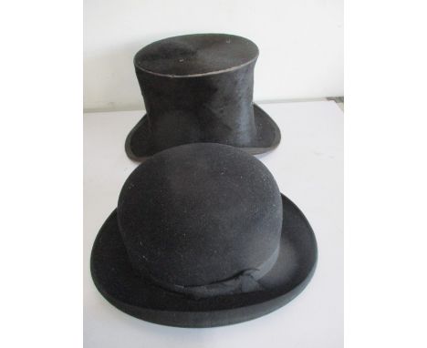 A vintage top hat along with a bowler hat