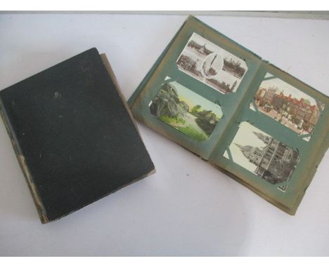 Two albums of vintage postcards