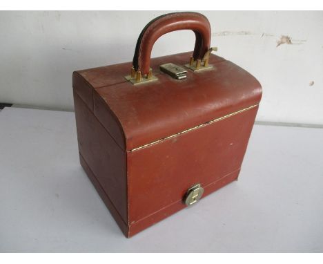 A vintage leather  "Le Tanneur" Gladstone style case with lower jewellery section- keys in office