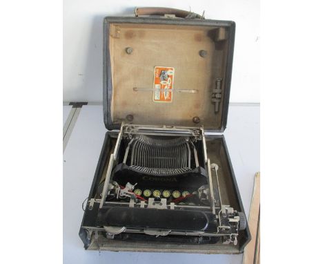 A vintage Corona typewriter in it's case 