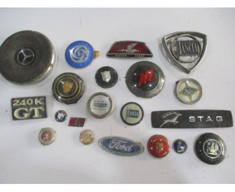 A small collection of vintage car badges including Ford, BMW, Jaguar, Vauxhall etc 