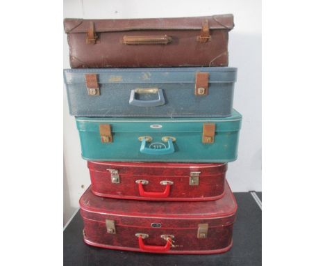 Five vintage suitcases