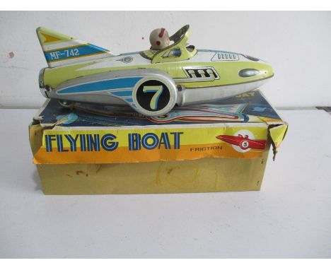 A boxed vintage Friction Flying Boat tin plate toy
