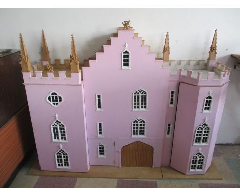 A large scale wooden dolls house with transformers - height 114cm, width 140cm
