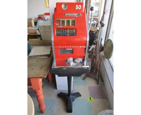 A vintage Sega "Starlet" one arm bandit coin operated fruit machine on handmade stand - key in office