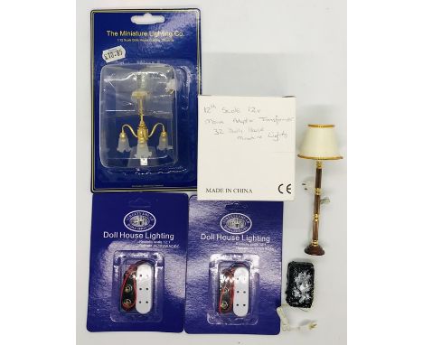 A small collection of dolls house lighting along with a 12v transformer 