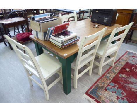 A modern honey coloured pine and green painted farmhouse style kitchen table, raised on block legs  30''h  62''L; and a match