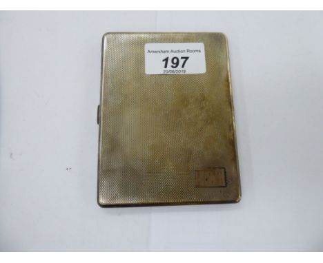 A silver cigarette case, the hinged body with engine turned decoration  Birmingham 1920       11