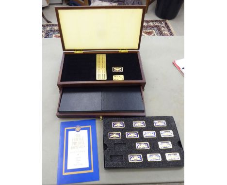 The Faberge Imperial dominos set, the blocks with gold plate and enamel  cased with a leaflet  boxed       OS8
