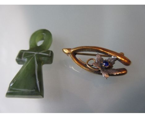 Wishbone brooch together with a small jade pendant