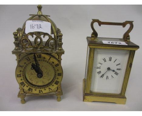 Small brass cased single train carriage clock with enamel dial and Roman numerals, together with a miniature reproduction bra