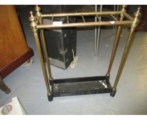 Early 20th Century brass six division stick stand with iron drip tray