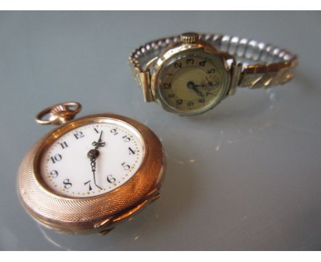 Yellow gold floral decorated fob watch with ceramic dial having Arabic numerals together with a ladies wristwatch