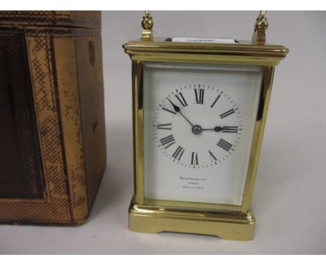 Good quality gilt brass cased carriage clock, the enamel dial with Roman numerals, signed Benetfink and Co., London, made in 
