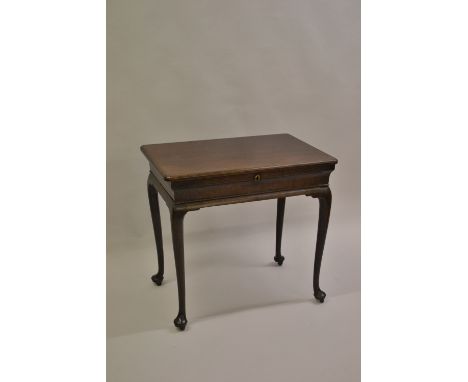 George III mahogany wig and patch / dressing table having hinged moulded lid enclosing a fitted interior above a moulded wais