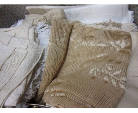 Small suitcase containing a quantity of liners and lace curtains and another suitcase containing various linen and clothes