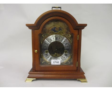 Modern reproduction mahogany three train bracket clock with moon phase dial