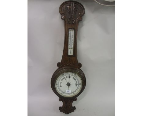 Victorian carved oak aneroid barometer thermometer