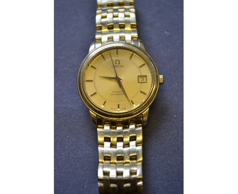 Gentleman's 18ct gold cased Omega automatic chronometer wristwatch, the dial with centre seconds and calendar aperture with a