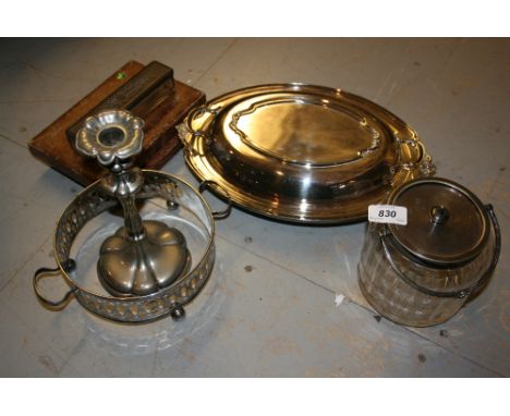 Oval silver plated entree dish, plated candlestick, glass biscuit barrel with plated mounts, two cased sets of flatware and t