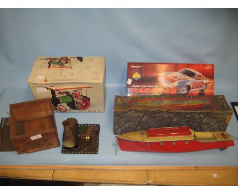Hornby clockwork model speed boat in original box (a/f) together with a small steam stationary engine, a boxed Mamod steam tr