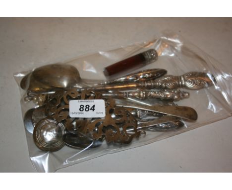 Small silver mounted ruby glass perfume bottle, silver belt buckle, various silver spoons, manicure items, button hooks etc.