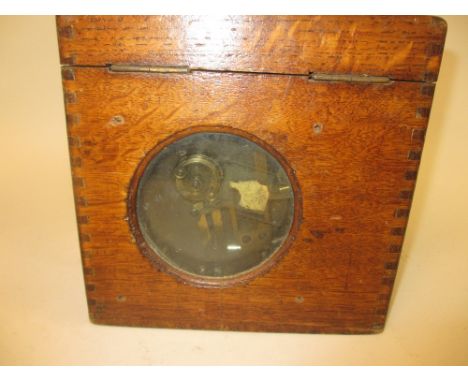 Oak cased pigeon timer clock