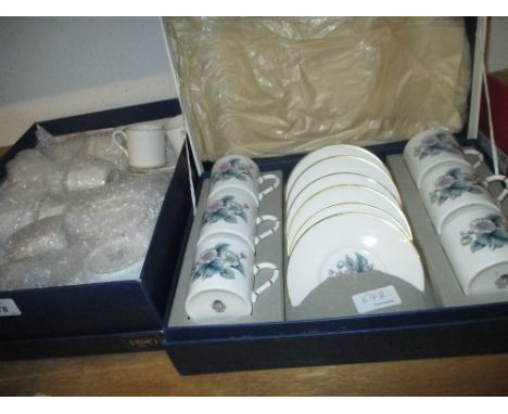 Boxed set of six Royal Worcester coffee cans and saucers, together with a set of ten Wedgwood Signet pattern coffee cans and 