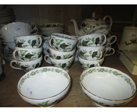 Foley Bone China tea service decorated with ivy leaves and an Aynsley part dinner service decorated in gilt on white