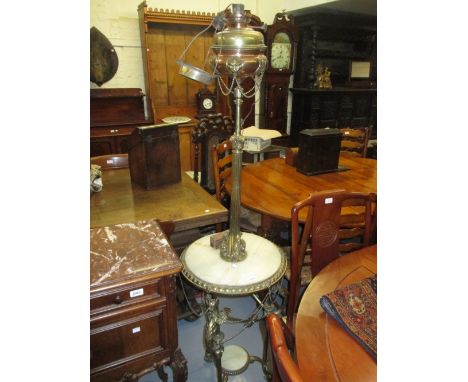 19th Century gilt brass and onyx oil lamp standard / occasional table, raised on gryphon supports