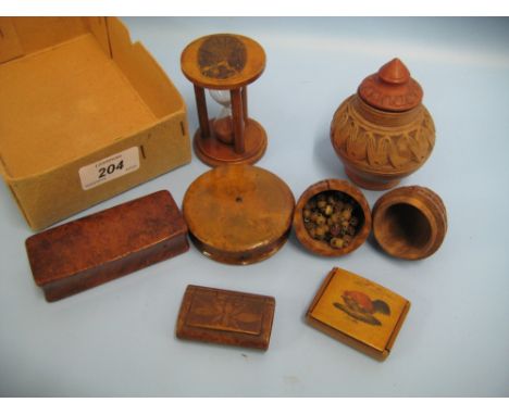 Mauchline ware egg timer decorated with the Nave, Crystal Palace, together with various other snuff boxes, pots etc
