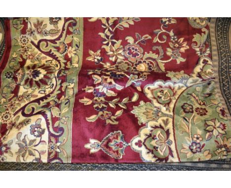 Tabriz style carpet having red ground, 2.8m x 2m