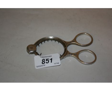 London silver tongs form lemon squeezer
